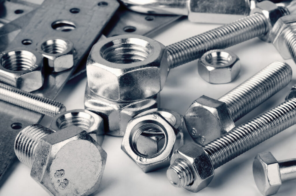 A close up of a bunch of stainless steel fasteners